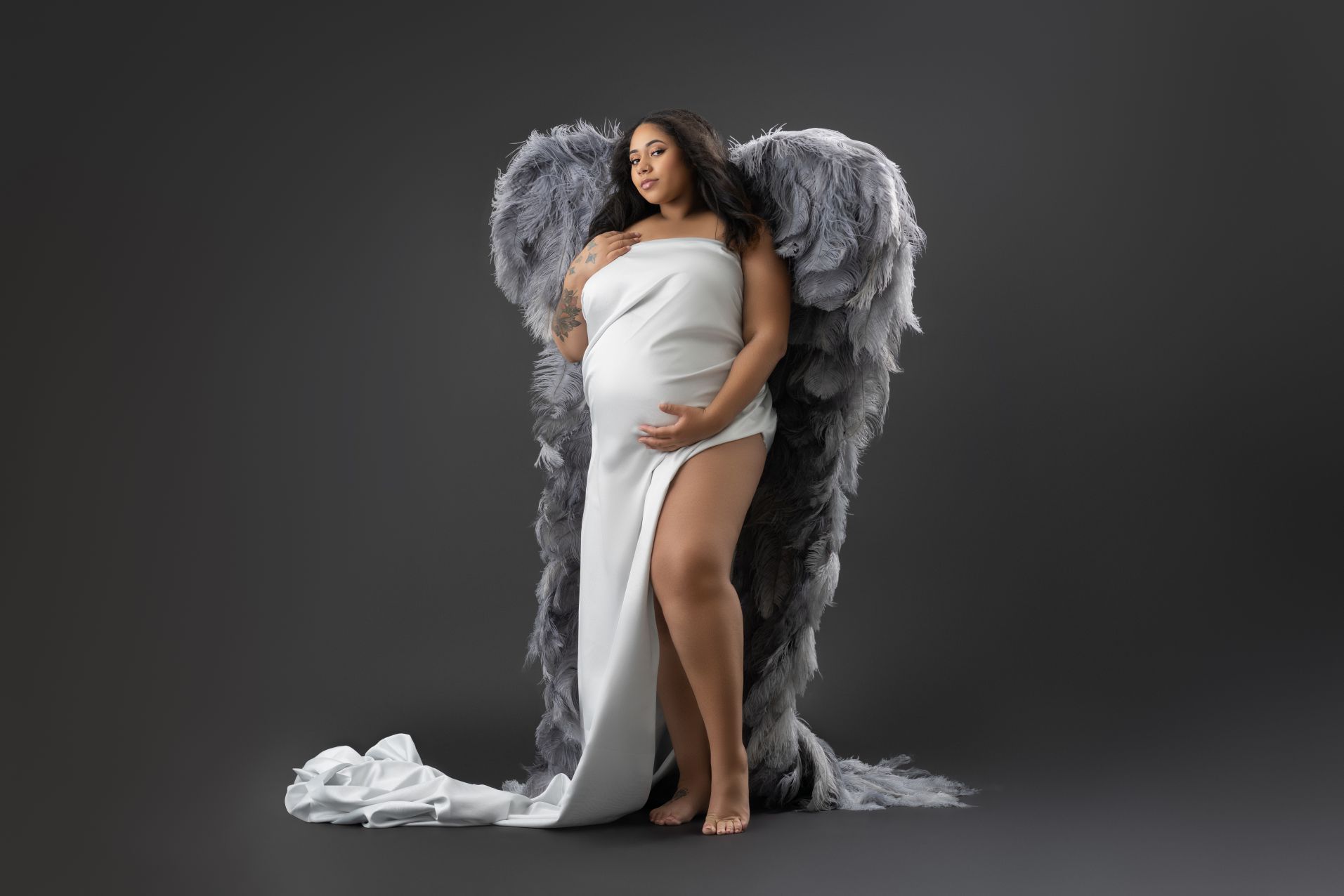 Modern Maternity Photoshoot angel wings gray blog