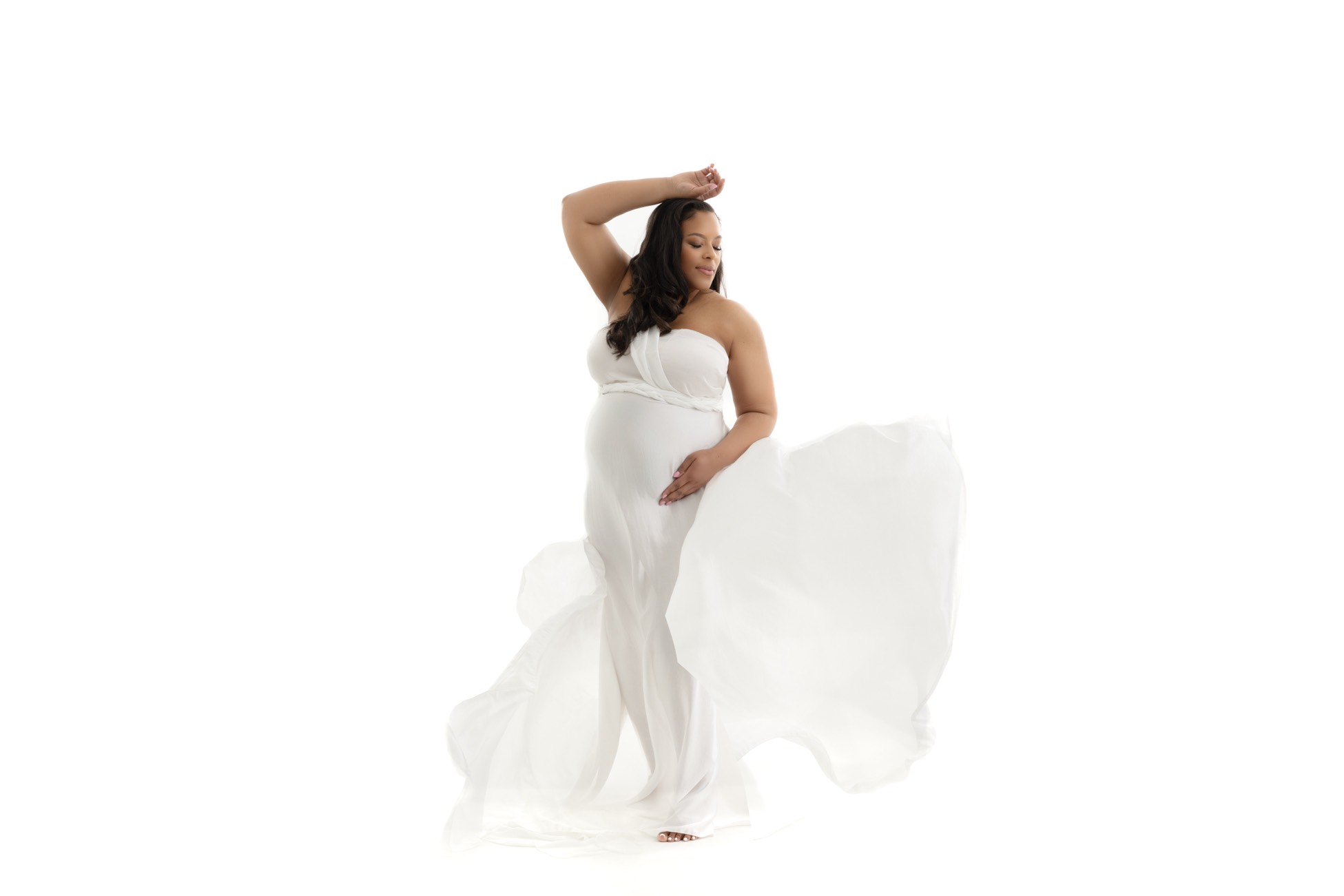 Modern luxury maternity photoshoot white dress flowing blog